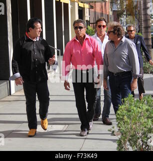 Sylvester Stallone talking a stroll with Chuck Zito and his brother Frank in Beverly Hills. Stallone stops to pose for selfies with fans in the street.  Featuring: Sylvester Stallone, Chuck Zito, Frank Stallone Where: Beverly Hills, California, United Sta Stock Photo