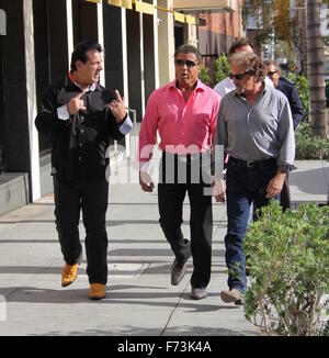 Sylvester Stallone talking a stroll with Chuck Zito and his brother Frank in Beverly Hills. Stallone stops to pose for selfies with fans in the street.  Featuring: Sylvester Stallone, Chuck Zito Where: Beverly Hills, California, United States When: 25 Oct Stock Photo