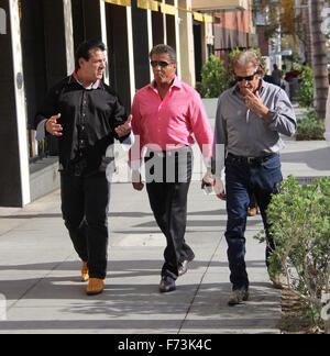 Sylvester Stallone talking a stroll with Chuck Zito and his brother Frank in Beverly Hills. Stallone stops to pose for selfies with fans in the street.  Featuring: Sylvester Stallone, Chuck Zito Where: Beverly Hills, California, United States When: 25 Oct Stock Photo