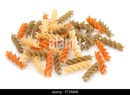 Color swirl dry pasta closeup isolated on white background Stock Photo