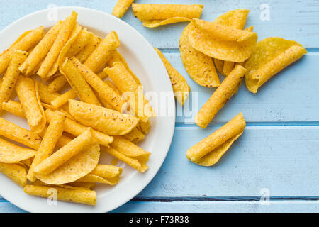 rolled nacho chips on table Stock Photo