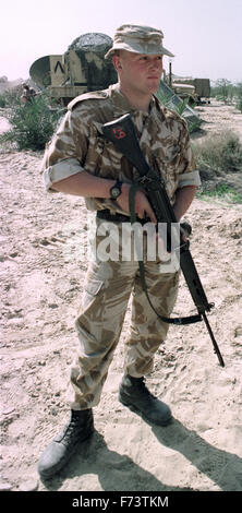 5th March 1991 A British soldier stands guard during the visit of British Defence Secretary Tom King at British Army HQ, Kuwait.