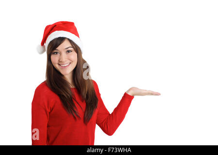 Santa Claus Christmas Woman pointing product on white background Stock Photo