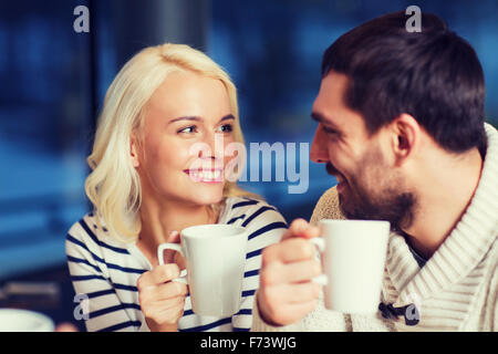 happy couple meeting and drinking tea or coffee Stock Photo