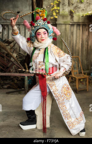 Chengdu, Pixian, Sichuan Province, China - Nov 15, 2015: Actress of Sichuan Opera posing before her performance. Stock Photo