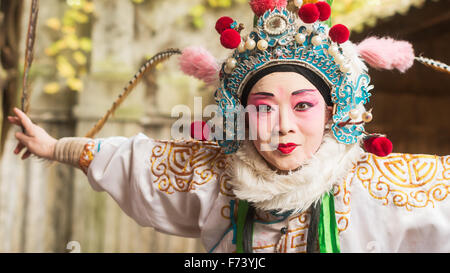 Chengdu, Pixian, Sichuan Province, China - Nov 15, 2015: Actress of Sichuan Opera posing before her performance. Stock Photo