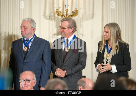 Composer and lyricist Stephen Sondheim, left, American film director, producer, philanthropist, and entrepreneur Steven Spielberg, center, and Singer, actor, director and songwriter Barbra Streisand, right, after receiving the Presidential Medal of Freedom from United States President Barack Obama during a ceremony in the East Room of the White House in Washington, DC on Tuesday, November 24, 2015. The Medal is the highest US civilian honor, presented to individuals who have made especially meritorious contributions to the security or national interests of the US, to world peace, or to cultura