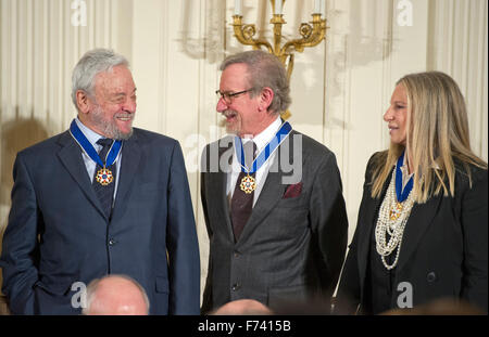 Composer and lyricist Stephen Sondheim, left, American film director, producer, philanthropist, and entrepreneur Steven Spielberg, center, and Singer, actor, director and songwriter Barbra Streisand, right, after receiving the Presidential Medal of Freedom from United States President Barack Obama during a ceremony in the East Room of the White House in Washington, DC on Tuesday, November 24, 2015. The Medal is the highest US civilian honor, presented to individuals who have made especially meritorious contributions to the security or national interests of the US, to world peace, or to cultura