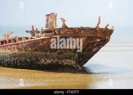 Old rusty shipwreck on the Skeleton Coast, Namibia Stock Photo