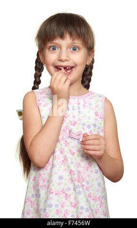 lost tooth girl portrait, studio shoot on white background Stock Photo