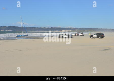 A Beached Yacht on the Coronado beach at San Diego California Stock Photo