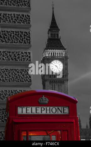 Big Ben Elizabeth Tower Houses of Parliament with traditional K6 red telephone phone box in foreground Westminster London Englan Stock Photo