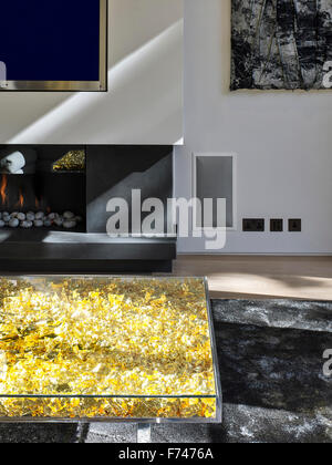 Gold leaf coffee table in living room of Chelsea Apartment, London, England, UK Stock Photo