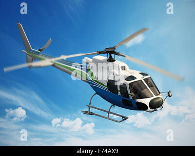 Helicopter flying through the sky Stock Photo