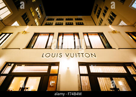 Louis Vuitton store at night, in Munich, Germany. Stock Photo