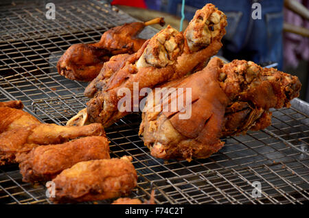 German Pork Hocks deep fried for sale at Don Wai Floating Market in Nakhon Pathom, Thailand. Stock Photo