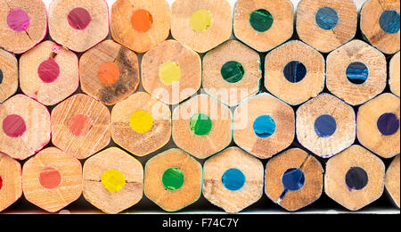 Stacked colouring pencils in colour ordered Stock Photo