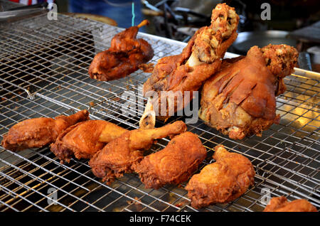 German Pork Hocks deep fried for sale at Don Wai Floating Market in Nakhon Pathom, Thailand. Stock Photo