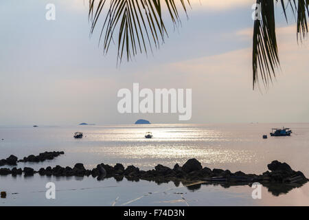 Sunset on the water of Tioman Island Stock Photo