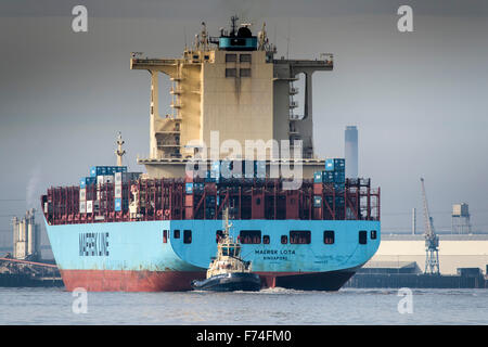 The container ship, Maersk Lota about to enter Tilbury Port on the River Thames. Stock Photo