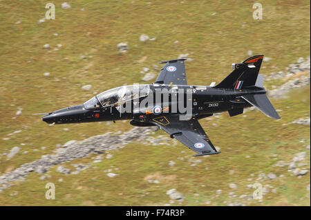 RAF Hawk T2 jet training aircraft on a low level flying exercise in Wales, UK. Stock Photo