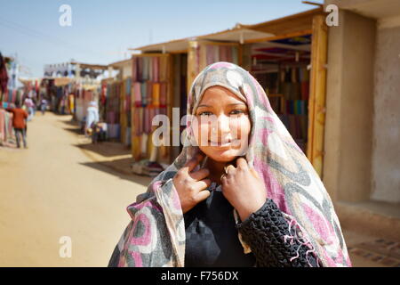 Egypt - Nubian village near Aswan, portrait of the nubian young woman in the street Stock Photo