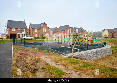 Riverside View on New Quay Road, Lancaster, in Lancashire. Same children's playground on a modern new estate   Young kids childr Stock Photo