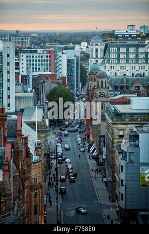 Manchester skyline showing the rooftops and the view down Peter street down to Quay street   tower light shaft rays through clou Stock Photo