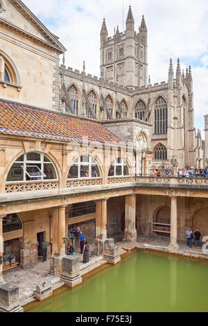 The Roman Baths with the Bath Abbey in the background, Bath Somerset England United Kingdom UK Stock Photo