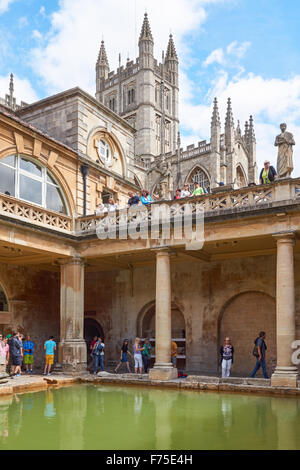 The Roman Baths with the Bath Abbey in the background, Bath Somerset England United Kingdom UK Stock Photo