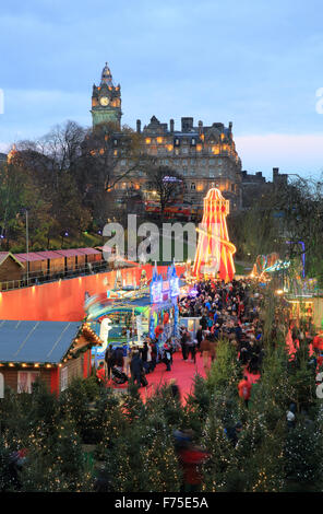 The beautiful Edinburgh German Christmas market in East Princes Street Gardens, at dusk, in Scotland, UK