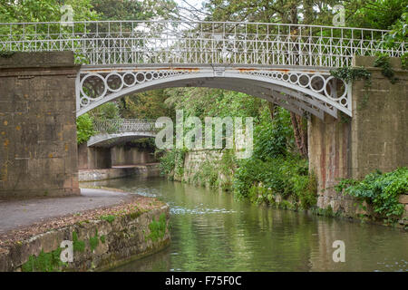 The cast iron bridges of Sydney Gardens over the Kennet and Avon Canal in Bath, Somerset England United Kingdom UK Stock Photo