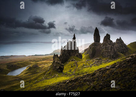 Dark rain clouds over The Old Man of Storr,Trotternish peninsular, Isle of Skye, Scotland Stock Photo