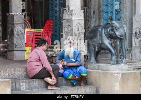 Sadhu holy man with long white beard and painted face at Kapaleeswarar Temple, a Hindu temple of Shiva in Mylapore, Chennai, Tamil Nadu, south India Stock Photo