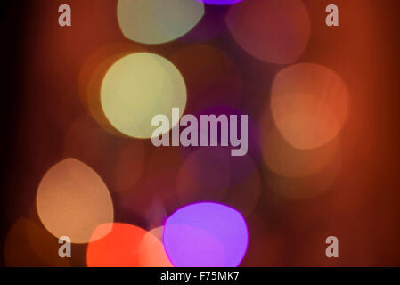 Defocused light blur background with bokeh style effect. Ideal for holiday greeting card, event invitation Stock Photo