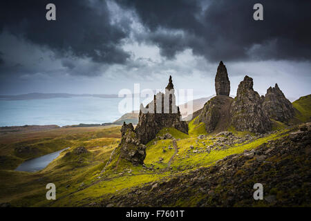 Dark rain clouds over The Old Man of Storr, Trotternish peninsular, Isle of Skye, Scotland Stock Photo