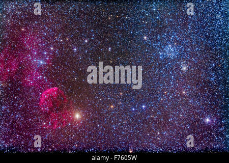 The Jellyfish Nebula, IC 443, at left near the star Eta Geminorum at left. IC 443 is a supernova remnant. At upper ight is the b Stock Photo