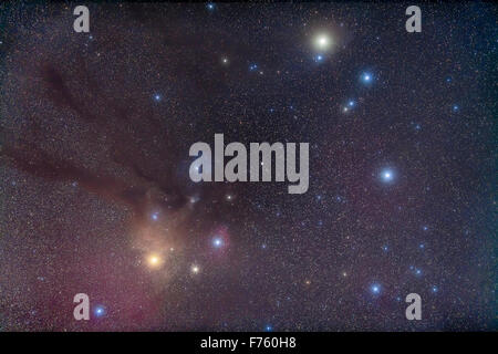 Saturn, at top right, off Beta Scorpii in the head of Scorpius, March 2015. Antares is the yellow star at lower left. The field Stock Photo