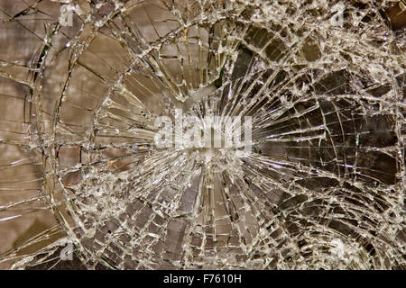 glass broken but held together with security film Stock Photo