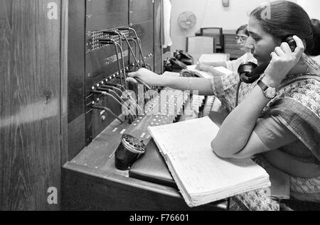 PBX telephone exchange operator , Bombay , Mumbai , Maharashtra , India , Asia , Old vintage 1900s picture Stock Photo