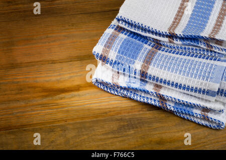 Tablecloth textile on wooden background. Stock Photo