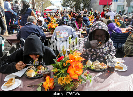 (151126)-- LOS ANGELS, Nov. 26, 2015 (Xinhua) -- People take their Thanksgiving meal in Los Angeles, the United States, on Nov. 25, 2015. Thousands of Skid Row residents and homeless people from downtown and beyond were served Thanksgiving dinners during the Los Angeles Mission's annual holiday feast. (Xinhua/Zhao Hanrong)(azp) Stock Photo