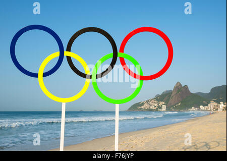 RIO DE JANEIRO, BRAZIL - OCTOBER 20, 2015: Olympic rings stand on the shore of Ipanema Beach in anticipation of the Summer Games Stock Photo