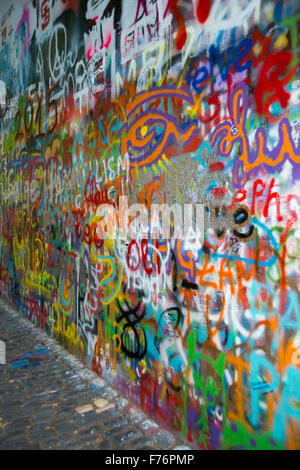 The Lennon Wall since the 1980s is filled with John Lennon-inspired graffiti Stock Photo