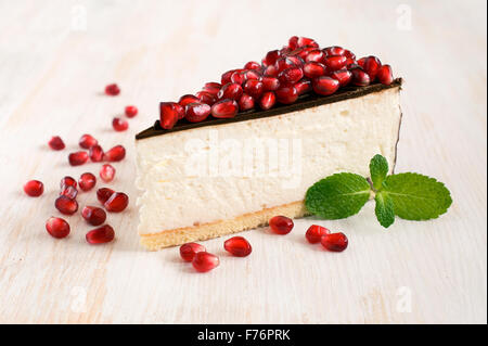 Cheesecake with chocolate and pomegranate Stock Photo