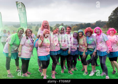 Runners having Dye thrown at them during race event in Derbyshire England Stock Photo