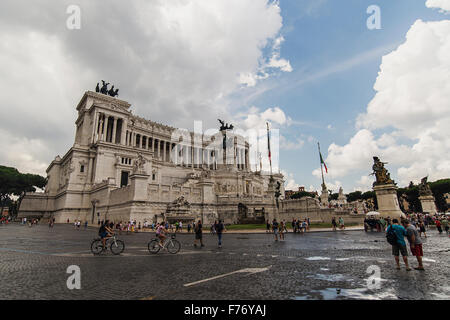 Tourists arround National Monument to Victor Emmanuel II in Rome Stock Photo