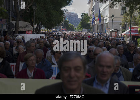 Athens, Greece. 26th November, 2015. Pensioners hold banners as they march to the Ministry of Health to protest against cuts. Pensioners staged a demonstration to protest over pension cuts and deteriorating health services. 26th Nov, 2015. Credit:  Nikolas Georgiou/ZUMA Wire/Alamy Live News Stock Photo