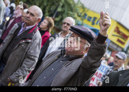 Athens, Greece. 26th November, 2015. Pensioners hold banners as they march to the Ministry of Health to protest against cuts. Pensioners staged a demonstration to protest over pension cuts and deteriorating health services. 26th Nov, 2015. Credit:  Nikolas Georgiou/ZUMA Wire/Alamy Live News Stock Photo