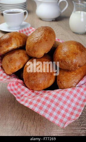 Freshly baked pies basket on the table Stock Photo